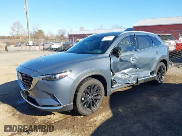 ✅ 2022 Mazda CX-9 Carbon Edition • VIN: JM3TCBDY1N0617356 • Lot: 43690029. Wystawiony na IAAI z przebiegiem 49 351 mil. Bezpłatny archiwum sprzedaży aukcyjnych z USA i szczegółowy raport historii pojazdu na DreamBid. Zdjęcie 2.