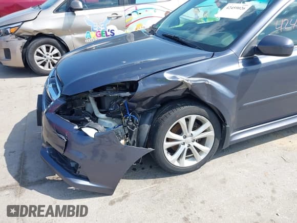 ✅ 2014 Subaru Legacy Premium • VIN: 4S3BMBC62E3018577 • Lot: 42459026. Listed on IAAI with 129,465 mi. Free auction sales archive from the USA and detailed vehicle history report at DreamBid. Image 6.