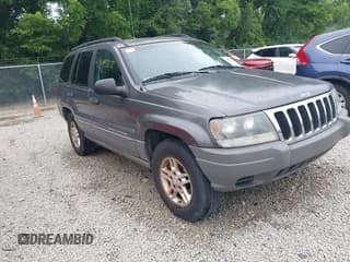 ✅ 2002 Jeep Grand Cherokee Laredo • VIN: 1J4GX48S42C245676 • Lot: 42699308. Listed on IAAI with 232,967 mi. Free auction sales archive from the USA and detailed vehicle history report at DreamBid. Image 1.