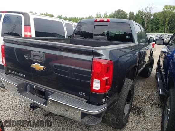 ✅ 2018 Chevrolet Silverado 1500 • VIN: TNV1N230158399080 • Лот: 63489073. Опубликован ранее на Copart с пробегом 80 942 миль. Бесплатный доступ к архиву аукционных продаж из США и подробный отчёт об истории автомобиля на DreamBid. Изображение 4.