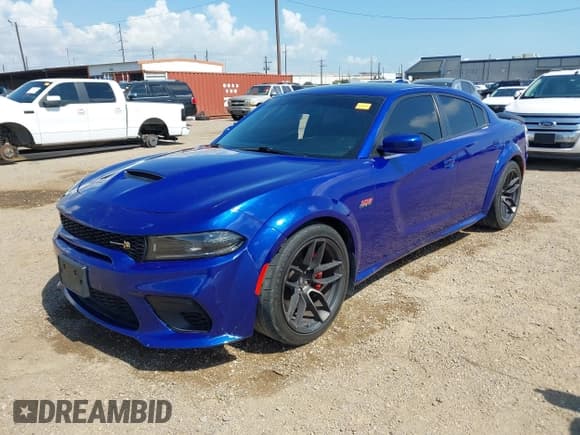 ✅ 2022 Dodge Charger Scat Pack Widebody • VIN: 2C3CDXGJ3NH121752 • Лот: 43407355. Опубликован ранее на IAAI с пробегом 62 632 миль. Бесплатный доступ к архиву аукционных продаж из США и подробный отчёт об истории автомобиля на DreamBid. Изображение 2.