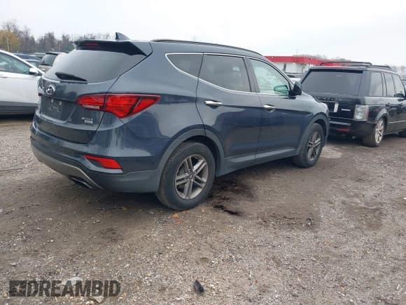 ✅ 2017 Hyundai Santa Fe 2.4L • VIN: 5NMZUDLBXHH034863 • Lot: 43744417. Listed on IAAI with 120,739 mi. Free auction sales archive from the USA and detailed vehicle history report at DreamBid. Image 4.