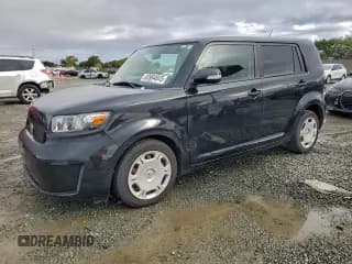 ✅ 2010 Scion xB • VIN: JTLZE4FE8A1117215 • Лот: 93964845. Опубликован ранее на Copart с пробегом 126 343 миль. Бесплатный доступ к архиву аукционных продаж из США и подробный отчёт об истории автомобиля на DreamBid. Изображение 1.