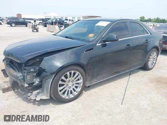 ✅ 2013 Cadillac CTS Performance • VIN: 1G6DJ5E34D0103574 • Lot: 43077955. Listed on IAAI with 185,739 mi. Free auction sales archive from the USA and detailed vehicle history report at DreamBid. Image 2.