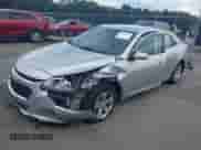 2016 Chevrolet Malibu LT z VIN 1G11C5SA5GF156985, wystawiony jako IAAI lot #42944353 z przebiegiem 159 538 mil mil oraz . Historia ofert i sprzedaży dostępna na DreamBid. Obrazek 2.