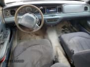 ✅ 1999 Ford Crown Victoria Police • VIN: 2FAFP71W4XX178478 • Lot: 71813314. Wystawiony na Copart z przebiegiem 207 956 mil. Bezpłatny archiwum sprzedaży aukcyjnych z USA i szczegółowy raport historii pojazdu na DreamBid. Zdjęcie 8.