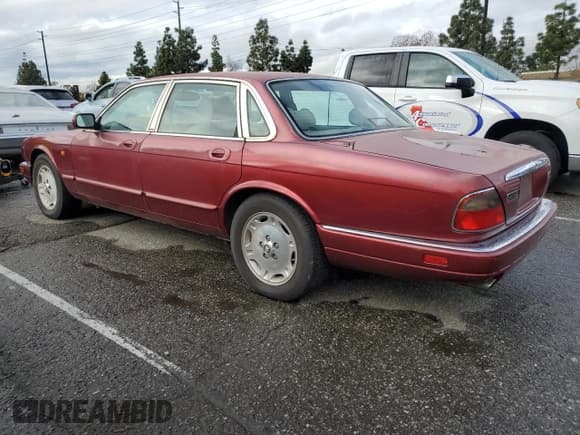 ✅ 1996 Jaguar XJ • VIN: SAJHX1740TC771088 • Lot: 46741735. Listed on Copart with 86,424 mi. Free auction sales archive from the USA and detailed vehicle history report at DreamBid. Image 2.
