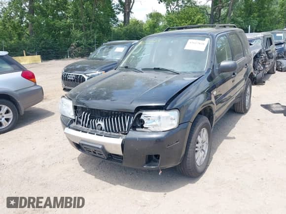 2005 Mercury Mariner Luxury with VIN 4M2CU56195DJ08478, listed as a IAAI auction lot 42617028 with 165,741 mi miles and . Bid and sale history available at DreamBid. Image 2.