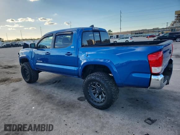 ✅ 2017 Toyota Tacoma SR5 • VIN: 5TFAZ5CN5HX049843 • Lot: 92034335. Listed on Copart with 58,922 mi. Free auction sales archive from the USA and detailed vehicle history report at DreamBid. Image 2.