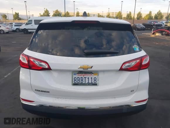 2018 Chevrolet Equinox LT z VIN 3GNAXJEV4JS576587, wystawiony jako IAAI lot #43061989 z przebiegiem 106 418 mil mil oraz . Historia ofert i sprzedaży dostępna na DreamBid. Obrazek 17.