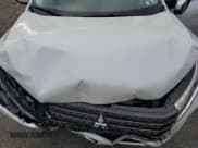 ✅ 2023 Mitsubishi Eclipse Cross SE • VIN: JA4ATWAA7PZ005928 • Lot: 86527485. Listed on Copart with 14,148 mi. Free auction sales archive from the USA and detailed vehicle history report at DreamBid. Image 12.