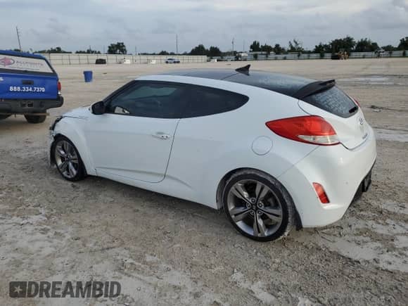 2012 Hyundai Veloster w/Red Int с VIN KMHTC6AD4CU076435, выставлен на аукционе Copart как лот 73015964 с пробегом 136 324 миль миль и Списание • Salvage title. История ставок и продаж доступна на DreamBid. Изображение 2.