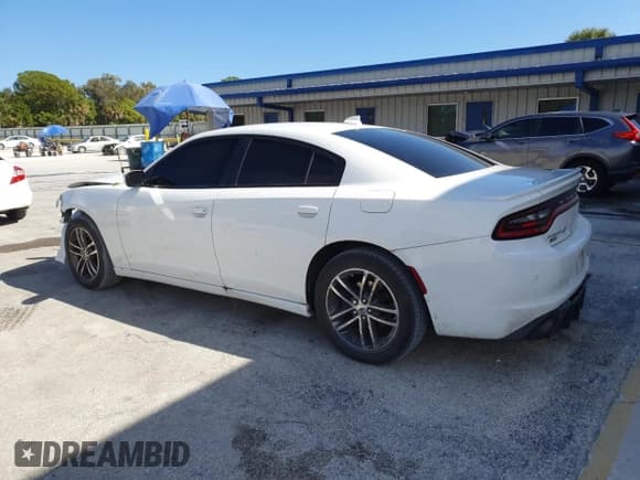 ✅ 2019 Dodge Charger SXT • VIN: 2C3CDXJG1KH568508 • Lot: 91339395. Listed on Copart with 83,632 mi. Free auction sales archive from the USA and detailed vehicle history report at DreamBid. Image 2.