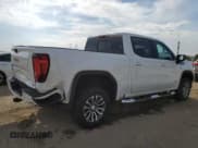 ✅ 2023 GMC Sierra 1500 AT4 • VIN: 1GTUUEE80PZ136104 • Lot: 83977275. Listed on Copart with 32,748 mi. Free auction sales archive from the USA and detailed vehicle history report at DreamBid. Image 3.