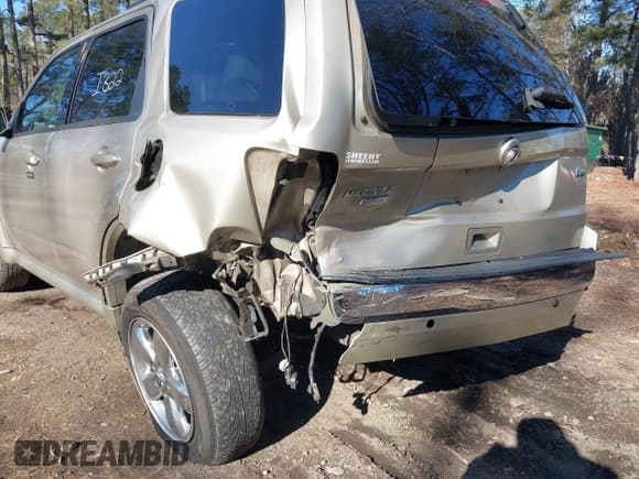 ✅ 2011 Mercury Mariner Premier • VIN: 4M2CN8HG3BKJ01842 • Lot: 41354524. Wystawiony na IAAI z przebiegiem 272 222 mil. Bezpłatny archiwum sprzedaży aukcyjnych z USA i szczegółowy raport historii pojazdu na DreamBid. Zdjęcie 6.
