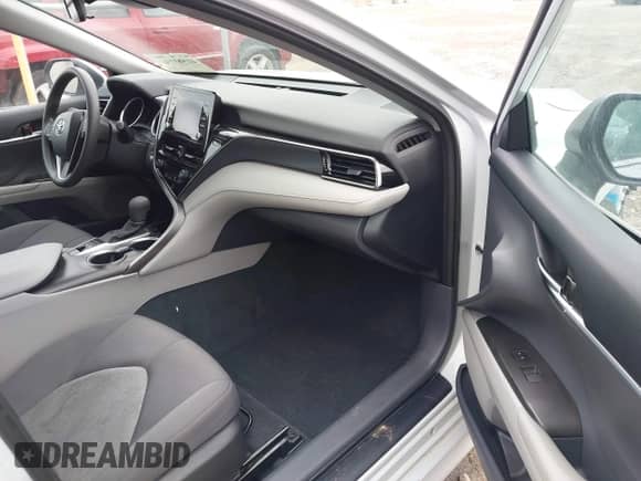 2023 Toyota Camry Hybrid LE with VIN 4T1C31AK8PU052114, listed as a IAAI auction lot 41982736 with 81,059 mi miles and . Bid and sale history available at DreamBid. Image 5.