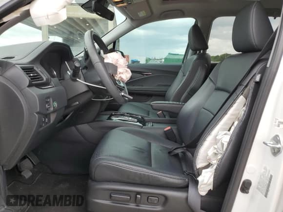 ✅ 2022 Honda Pilot Touring 7-Passenger • VIN: 5FNYF5H65NB030899 • Lot: 67962524. Listed on Copart with 34,124 mi. Free auction sales archive from the USA and detailed vehicle history report at DreamBid. Image 7.