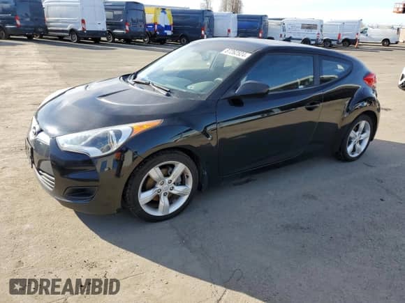 2012 Hyundai Veloster w/Red Int z VIN KMHTC6AD2CU065143, wystawiony jako Copart lot #87262524 z przebiegiem 111 448 mil mil oraz Czysty tytuł • Clean title. Historia ofert i sprzedaży dostępna na DreamBid. Obrazek 1.