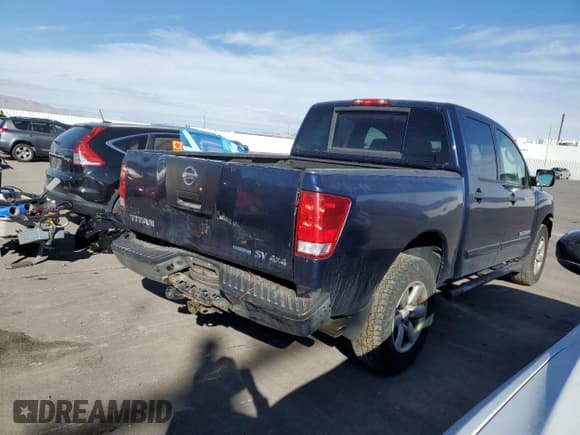 ✅ 2011 Nissan Titan SV • VIN: 1N6BA0EJ5BN309733 • Lot: 44375035. Listed on Copart with 203,675 mi. Free auction sales archive from the USA and detailed vehicle history report at DreamBid. Image 3.