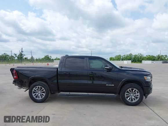 2020 Ram 1500 Laramie with VIN 1C6RREJT2LN295149, listed as a IAAI auction lot 42411146 with 113,445 mi miles and . Bid and sale history available at DreamBid. Image 13.
