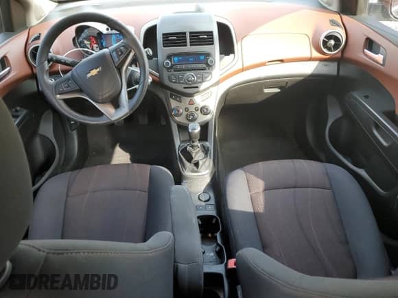 2012 Chevrolet Sonic LT z VIN 1G1JD6SB6C4178155, wystawiony jako Copart lot #68938734 z przebiegiem 176 298 mil mil oraz Szkoda całkowita • Salvage title. Historia ofert i sprzedaży dostępna na DreamBid. Obrazek 8.