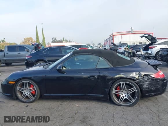 ✅ 2009 Porsche 911 Carrera S • VIN: WP0CB29929S756077 • Lot: 43611285. Listed on IAAI with 56,587 mi. Free auction sales archive from the USA and detailed vehicle history report at DreamBid. Image 14.