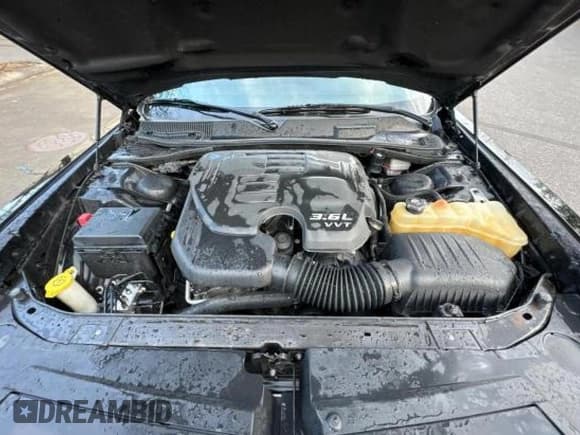 ✅ 2013 Dodge Challenger SXT • VIN: 2C3CDYAGXDH549092 • Lot: 84967784. Wystawiony na Copart z przebiegiem 117 991 mil. Bezpłatny archiwum sprzedaży aukcyjnych z USA i szczegółowy raport historii pojazdu na DreamBid. Zdjęcie 7.