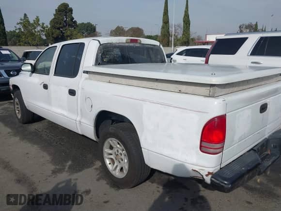 ✅ 2000 Dodge Dakota Sport • VIN: 1B7GL2AN8YS654014 • Лот: 41470554. Размещён на IAAI с пробегом 181 931 миль миль. Получите бесплатный доступ к архиву аукционных продаж из США и посмотрите подробный отчёт об истории автомобиля на DreamBid. Изображение 14.