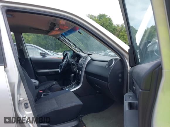 ✅ 2007 Suzuki Grand Vitara • VIN: JS3TE941774200514 • Лот: 42878080. Опубликован ранее на IAAI с пробегом Не указан. Бесплатный доступ к архиву аукционных продаж из США и подробный отчёт об истории автомобиля на DreamBid. Изображение 5.