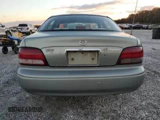 ✅ 1999 Mazda 626 ES • VIN: 1YVGF22C1X5846046 • Лот: 86368224. Опубликован ранее на Copart с пробегом 163 172 миль. Бесплатный доступ к архиву аукционных продаж из США и подробный отчёт об истории автомобиля на DreamBid. Изображение 6.