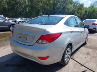 2015 Hyundai Accent GLS with VIN KMHCT4AE9FU930904, listed as a IAAI auction lot 43282089 with 143,833 mi miles and . Bid and sale history available at DreamBid. Image 4.