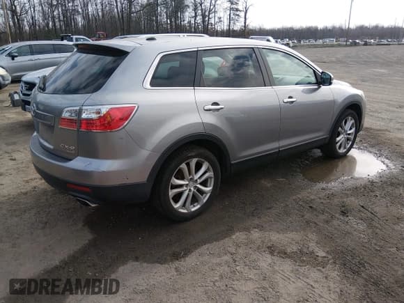 ✅ 2011 Mazda CX-9 Grand Touring • VIN: JM3TB3DVXB0332987 • Lot: 43934305. Listed on IAAI with 180,860 mi. Free auction sales archive from the USA and detailed vehicle history report at DreamBid. Image 4.