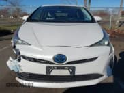 ✅ 2018 Toyota Prius Two • VIN: JTDKBRFU8J3066748 • Lot: 43765334. Listed on IAAI with 102,218 mi. Free auction sales archive from the USA and detailed vehicle history report at DreamBid. Image 12.