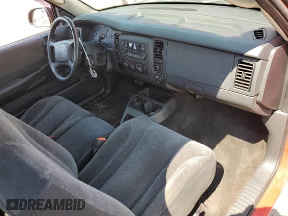 2004 Dodge Dakota Sport z VIN 1D7GL32K14S548787, wystawiony jako Copart lot #81157425 z przebiegiem 149 931 mil mil oraz Czysty tytuł • Clean title. Historia ofert i sprzedaży dostępna na DreamBid. Obrazek 8.