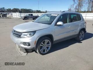 ✅ 2012 Volkswagen Tiguan S • VIN: WVGAV7AX3CW557153 • Lot: 93048795. Listed on Copart with 173,323 mi. Free auction sales archive from the USA and detailed vehicle history report at DreamBid. Image 1.