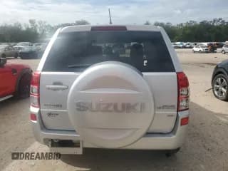 ✅ 2010 Suzuki Grand Vitara Premium • VIN: JS3TD0D26A4100645 • Lot: 79252814. Wystawiony na Copart z przebiegiem 77 207 mil. Bezpłatny archiwum sprzedaży aukcyjnych z USA i szczegółowy raport historii pojazdu na DreamBid. Zdjęcie 6.