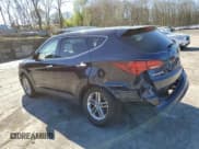 ✅ 2018 Hyundai Santa Fe 2.4L • VIN: 5XYZTDLB1JG514440 • Лот: 50703004. Опубликован ранее на Copart с пробегом 92 545 миль. Бесплатный доступ к архиву аукционных продаж из США и подробный отчёт об истории автомобиля на DreamBid. Изображение 2.