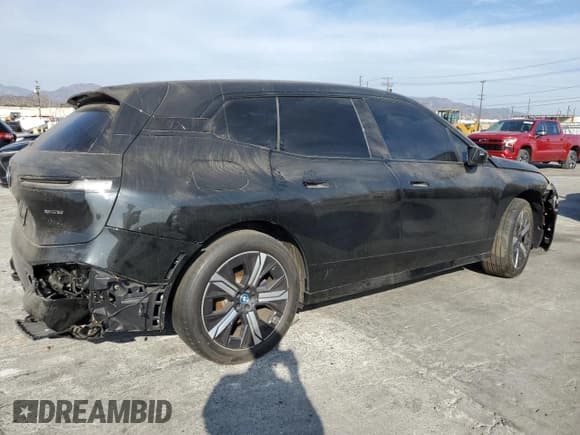 ✅ 2024 BMW iX xDrive50 • VIN: WB523CF0XRCN71950 • Lot: 65383745. Listed on Copart with 36,375 mi. Free auction sales archive from the USA and detailed vehicle history report at DreamBid. Image 3.