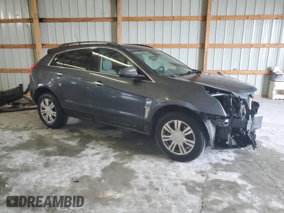 ✅ 2011 Cadillac SRX • VIN: 3GYFNGEY1BS596700 • Lot: 84434825. Wystawiony na Copart z przebiegiem 134 514 mil. Bezpłatny archiwum sprzedaży aukcyjnych z USA i szczegółowy raport historii pojazdu na DreamBid. Zdjęcie 4.