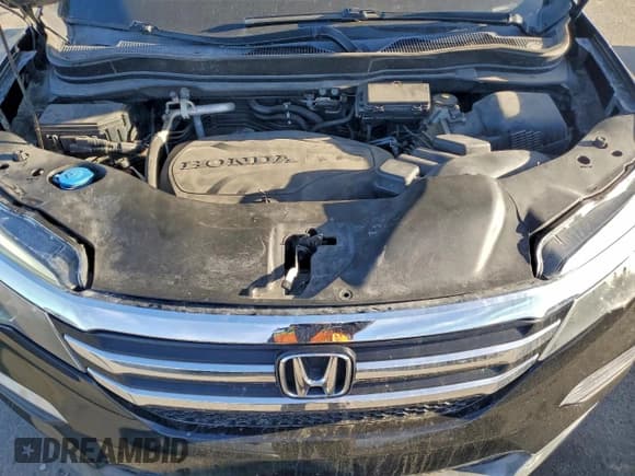 ✅ 2017 Honda Pilot EX-L • VIN: 5FNYF6H57HB017315 • Lot: 95162905. Listed on Copart with 76,964 mi. Free auction sales archive from the USA and detailed vehicle history report at DreamBid. Image 12.