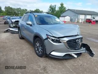 ✅ 2018 Mazda CX-9 Sport • VIN: JM3TCBBYXJ0227577 • Lot: 43054148. Listed on IAAI with 108,394 mi. Free auction sales archive from the USA and detailed vehicle history report at DreamBid. Image 1.