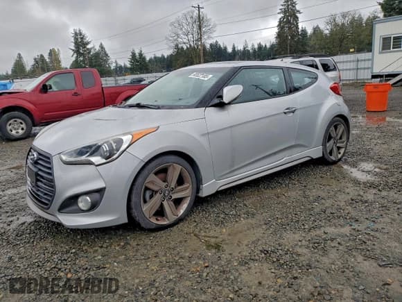 ✅ 2013 Hyundai Veloster Turbo • VIN: KMHTC6AE8DU083107 • Lot: 93522185. Listed on Copart with 114,998 mi. Free auction sales archive from the USA and detailed vehicle history report at DreamBid. Image 1.