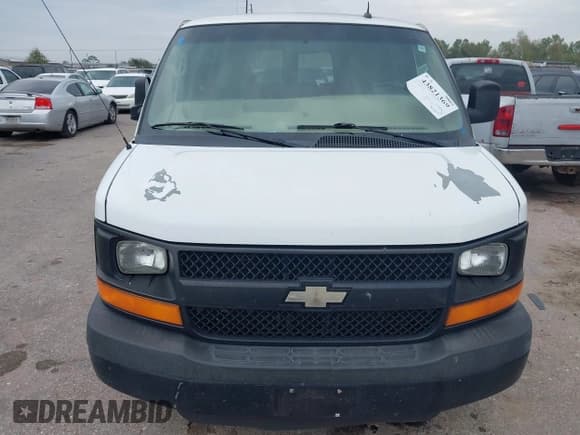 ✅ 2014 Chevrolet Express Passenger LS • VIN: 1GAZGZFGXE1112875 • Lot: 43821369. Listed on IAAI with 162,209 mi. Free auction sales archive from the USA and detailed vehicle history report at DreamBid. Image 12.