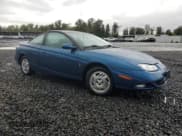 ✅ 2001 Saturn SC • VIN: 1G8ZR12791Z118164 • Лот: 74393904. Опубликован ранее на Copart с пробегом 158 308 миль. Бесплатный доступ к архиву аукционных продаж из США и подробный отчёт об истории автомобиля на DreamBid. Изображение 4.