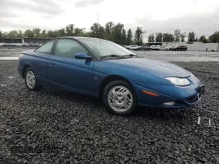 ✅ 2001 Saturn SC • VIN: 1G8ZR12791Z118164 • Лот: 74393904. Опубликован ранее на Copart с пробегом 158 308 миль. Бесплатный доступ к архиву аукционных продаж из США и подробный отчёт об истории автомобиля на DreamBid. Изображение 4.