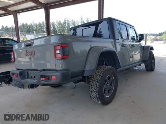 ✅ 2022 Jeep Gladiator Rubicon • VIN: 1C6JJTBG6NL166081 • Lot: 42204431. Listed on IAAI with 40,568 mi. Free auction sales archive from the USA and detailed vehicle history report at DreamBid. Image 4.