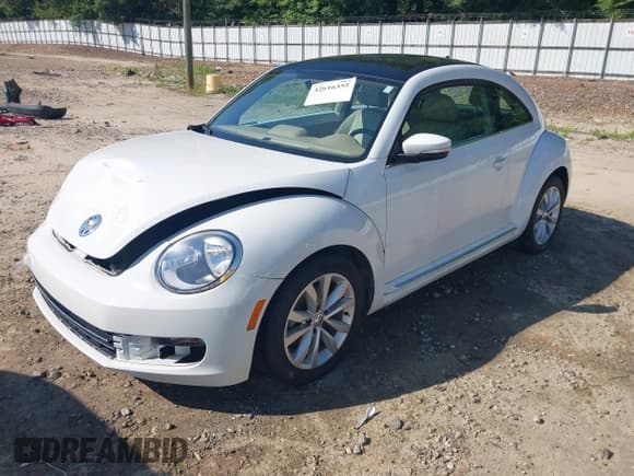 ✅ 2014 Volkswagen Beetle 2.0L TDI w/Sun/Sound/Nav • VIN: 3VWJL7AT1EM661941 • Лот: 42616355. Опубликован ранее на IAAI с пробегом 76 091 миль. Бесплатный доступ к архиву аукционных продаж из США и подробный отчёт об истории автомобиля на DreamBid. Изображение 17.