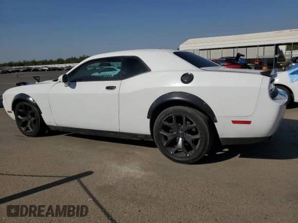 2013 Dodge Challenger SXT z VIN 2C3CDYAG4DH704333, wystawiony jako Copart lot #69514464 z przebiegiem 126 734 mil mil oraz Szkoda całkowita • Salvage title. Historia ofert i sprzedaży dostępna na DreamBid. Obrazek 2.