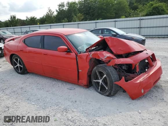 2010 Dodge Charger SXT with VIN 2B3CA3CVXAH228122, listed as a Copart auction lot 63802564 with 198,249 mi miles and Salvage title. Bid and sale history available at DreamBid. Image 4.