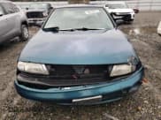 ✅ 1997 Nissan Altima XE • VIN: 1N4BU31D3VC222205 • Lot: 84018274. Listed on Copart with 261,349 mi. Free auction sales archive from the USA and detailed vehicle history report at DreamBid. Image 5.